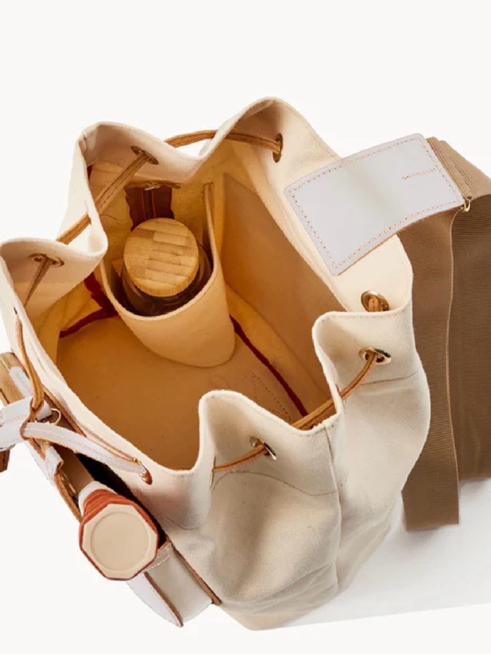 Dooney & Bourke Cream Canvas Drawstring Tote with Leather Paddle Detail - Picture 3 of 5